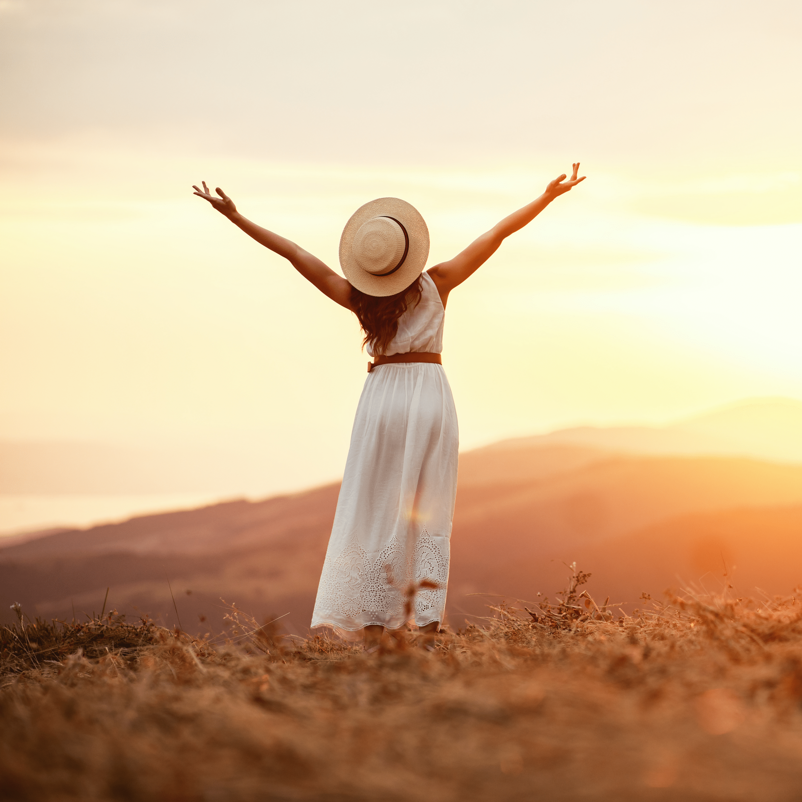 A women with here arms in the air