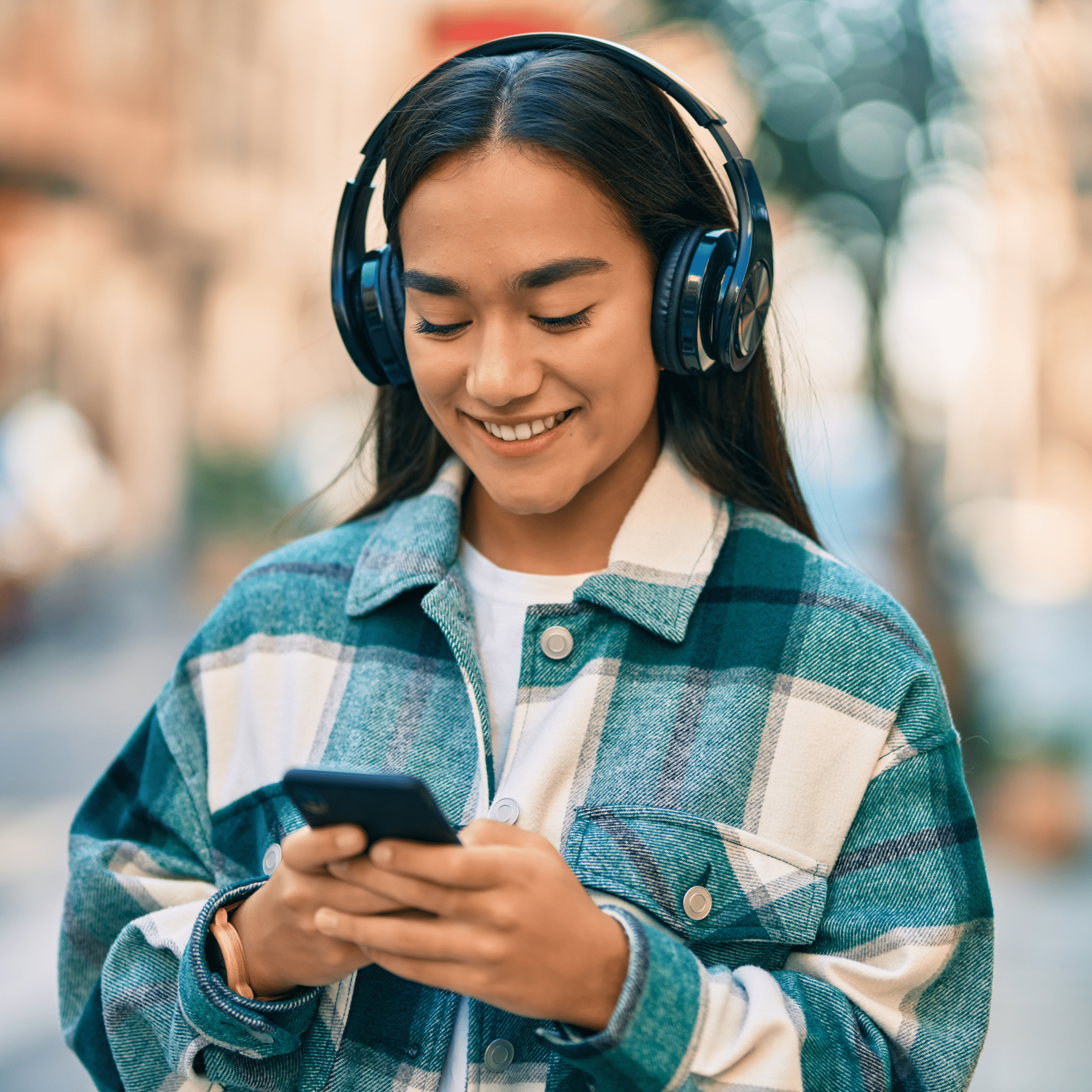 a women looking at her cell phone