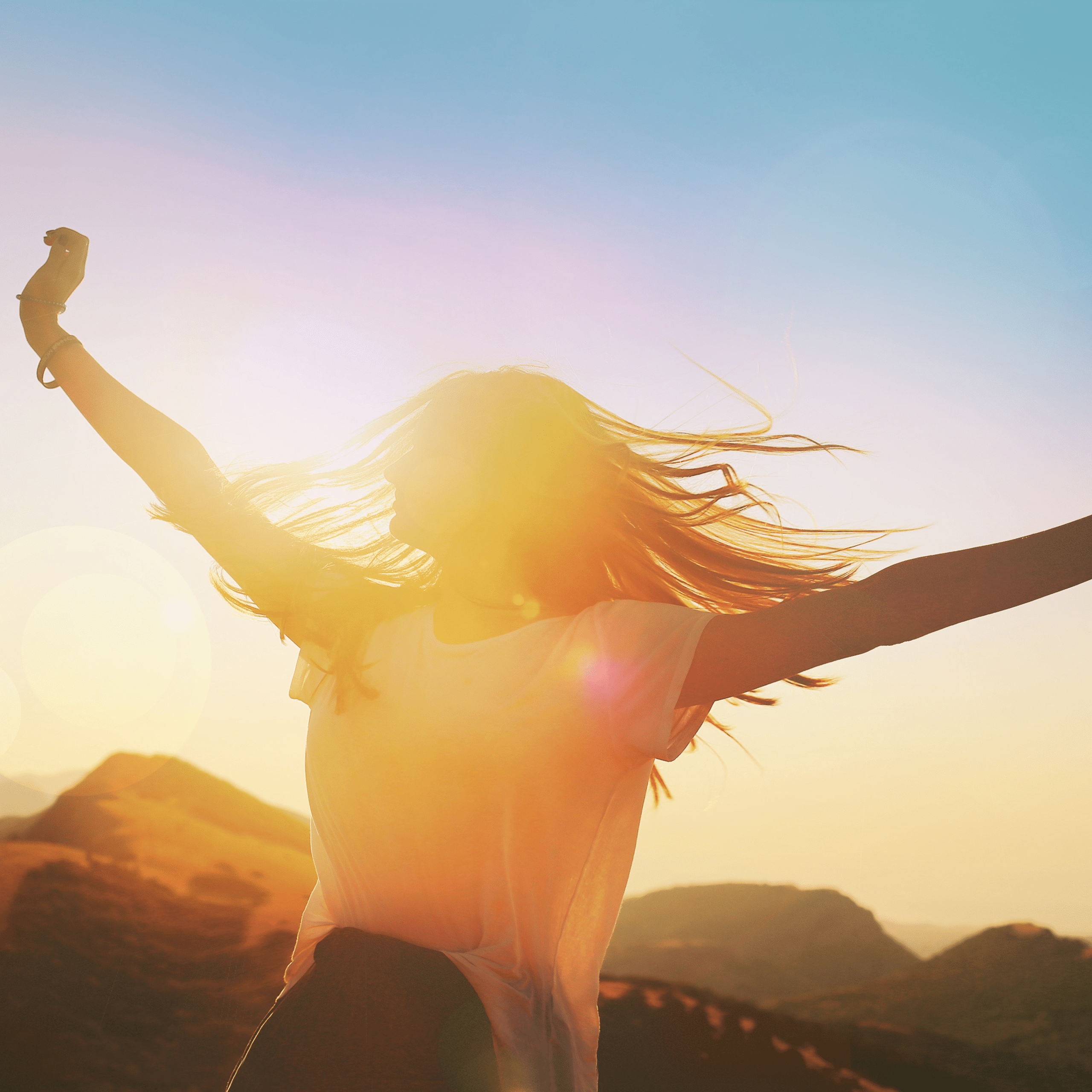 A girl with her arms stretched out